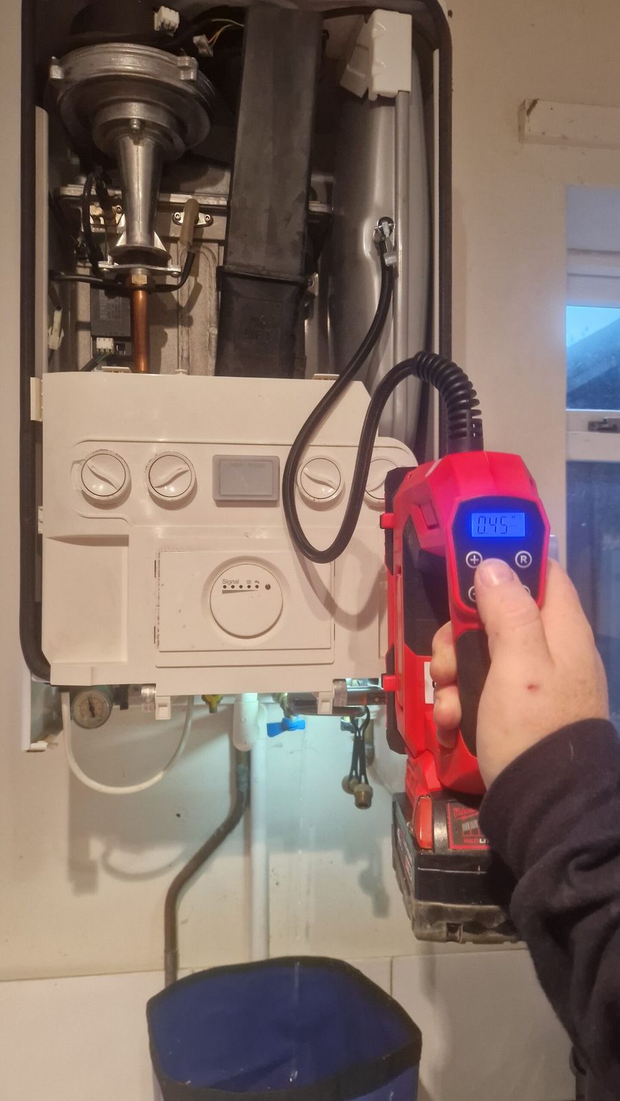 Combustion analyser reading taken on an open gas boiler during a service